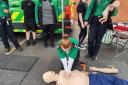 St John Ambulance volunteers demonstrate CPR skills