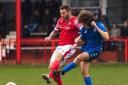 Tom Greaves (red) scored a brace in Thackley's 3-2 win on Saturday. Photo: Martin Taylor