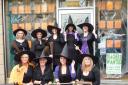 Staff at Rotherwood Recruitment in Keighley don witches outfits for Halloween, 2009