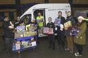 Staff from the Casualty Prevention Unit and Officers from the Roads Prevention Unit hand over toys donated to Bradford Cinderella Club.