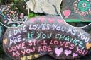 Some of the pebbles and messages at Roberts Park, Saltaire