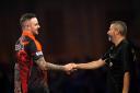 Joe Cullen (left) shakes Darren Penhall's hand after the pair's game 11 days ago at Alexandra Palace.