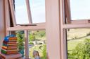 The hotel bedrooms look out to views of Burnsall and its fells. Images: Devonshire Hotels