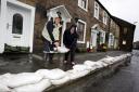 Residents build a wall of sandbags - can you name the street?