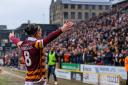 Calum Kavanagh salutes the fans after scoring City's winner