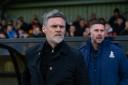 Graham Alexander and Chris Lucketti watch Saturday's game