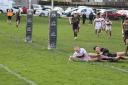Adam Gaunt squeezes over to score the winning try for Keighley.