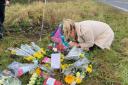 Abby Lever at the roadside of where her husband Ewen was fatally killed in a crash