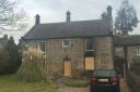 The fire-damaged house at The Green, Addingham