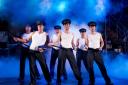 The terrific cast of The Full Monty, at the Alhambra this week