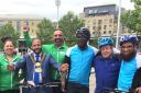 Rifaqat Ali (right) with cyclists taking part in a charity ride in July to benefit victims of the Manchester Arena bombing