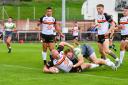 Steve Crossley goes over for a try in Bradford Bulls' 104-0 rout of West Wales Raiders