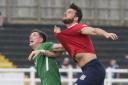 Bradford (Park Avenue) striker Jake Beesley battles for the ball with York City's Sean Newton at Horsfall Stadium yesterday. Picture: Ian Parker 