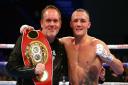 Chris Moyles (left) and Josh Warrington (right) pose for a picture after his win against Kid Galahad during The IBF World Featherweight Championship at the First Direct Arena, Leeds

