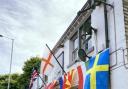 The Woodman, in Manchester Road, has a host of flags representing the nations competing in Euro 2020 outside the pub