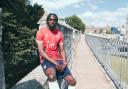 Clayton Donaldson poses in the new York strip - but his contract does not begin until next month