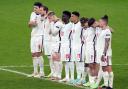 Jadon Sancho, number 17, and Bukayo Saka alongside their England team-mates during the penalty shoot-out at Sunday’s final - both missed their spot-kicks along with Marcus Rashford as Italy triumphed. Picture: Mike Egerton/PA Wire