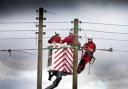 Workers from Northern Powergrid carry out repairs on power lines