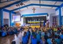 Children and staff at Our Lady & St Brendan’s Catholic Primary School dressed in blue and yellow and created messages of love and support. Pictures: RA Photography.