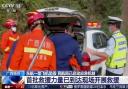 In this image taken from video footage run by China’s CCTV, emergency personnel prepare to travel to the site of a plane crash near Wuzhou (CCTV via AP, PA)