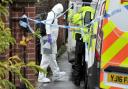 Forensics officers in the Shirley Grove area of Lighcliffe after the death of Dawn Walker