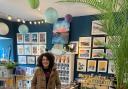 Katie among the many creative items inthe shop