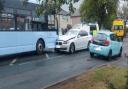 A bus and white BMW crashed on Wrose Road