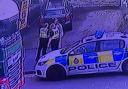 Screenshot of a viral video which shows a West Yorkshire Police officer appearing to push a man on Queens Road, Bradford, 11 times
