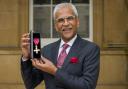 Dr Mahendra Patel OBE, pictured at Buckingham Palace