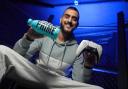 Awais Hussain, of GG Gaming, with a bottle of Prime
