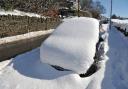 A snow-covered car near Keelham