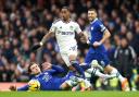 Leeds United's Crysencio Summerville is tackled by Chelsea's Ben Chilwell (left) during the Premier League match at Stamford Bridge, London. Picture date: Saturday March 4, 2023