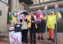 Organisers of the Silsden Easter Egg Hunt and representatives of Acorn Stairlifts with some of the donated Easter eggs.