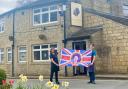Staff at The Turkey Inn pub get ready to mark the King's coronation this Saturday