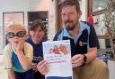 Young swimmer Alexander Dunn, left, saved his dad's life on holiday. He is pictured with his Swimbabes teacher Fiona Mellor and RLSS course tutor Garry Hume
