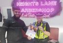 Barber Abbas Hussain and PCSO Clapperton are highlighting a 'Cut It Out' campaign aimed at tackling domestic abuse.