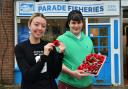 Ellie Robertshaw - granddaughter of the knitted poppies' creator Susan Rimmer - and Dylan Roberts, owner of Parade Fisheries in Cottingley