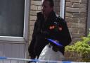 A Crime Scene Investigator at a house in Thackley