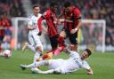 Robin Kock makes a slide tackle for Leeds against Bournemouth last April, with the West Yorkshire side relegated from the Premier League less than a month later.
