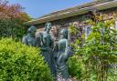Bronte sisters statue at the Parsonage Museum. Pic: Bevan Cockerill