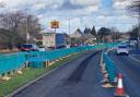 Blue barriers have been put up Rooley Lane as works by Northern Powergrid begins. The work is causing traffic to back up.
