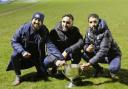 The coaching staff at Bradford United after claiming a trophy