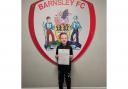 Ellis Sudell having just signed his contract at League One side Barnsley