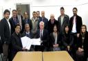 David Ward, front centre, receives a petition calling for action by the Government on Kashmir