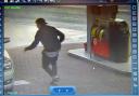 A CCTV image of the thief running to steal Mohammed Gafoor's taxi at the Texaco filling station in Great Horton Road, Horton Bank Top