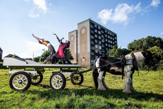 Bradford Telegraph and Argus: Horse and cart carnival highlights Holme Wood Traveller community Keira Martin and Sonia Sabri with Rambo the horse. Picture: Joe Armitage/Boneshaker Photos
