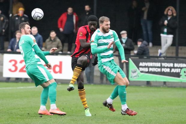 Nickseon Gomis, middle, in action for Bradford (Park Avenue) at Farsley Celtic. Pictures: John Rhodes