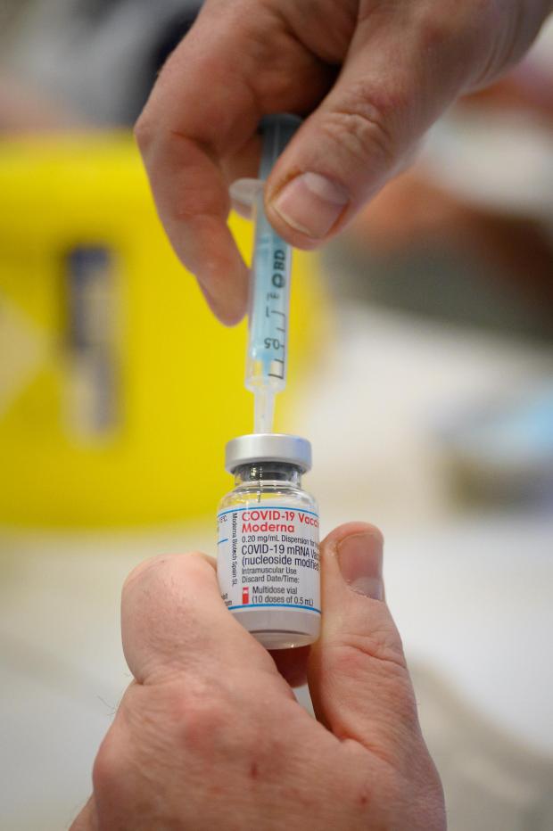 Bradford Telegraph and Argus: A Covid vaccine being prepared. Credit: PA