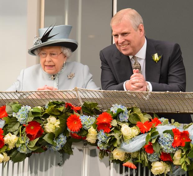 Bradford Telegraph and Argus: (left to right) Queen Elizabeth II and Prince Andrew. Credit: PA