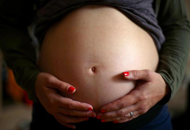 Bradford Telegraph and Argus: A pregnant woman. Credit: PA